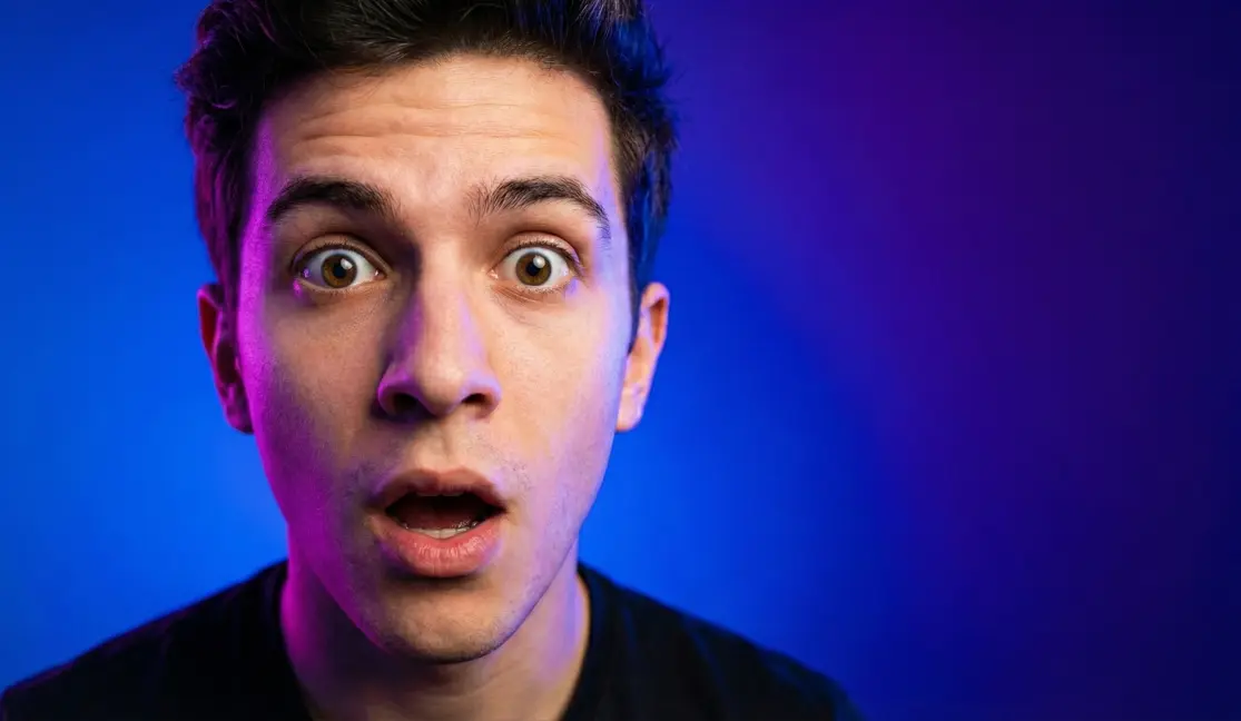 YouTube thumbnail with expressive face and high contrast